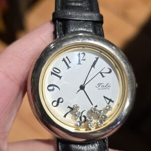 Women's Black Leather and Silver Watch